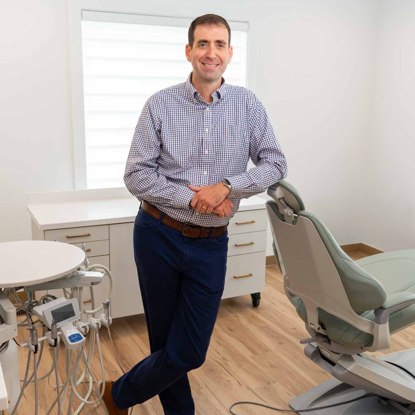 Dr. Ben McDonald standing in a treatment room